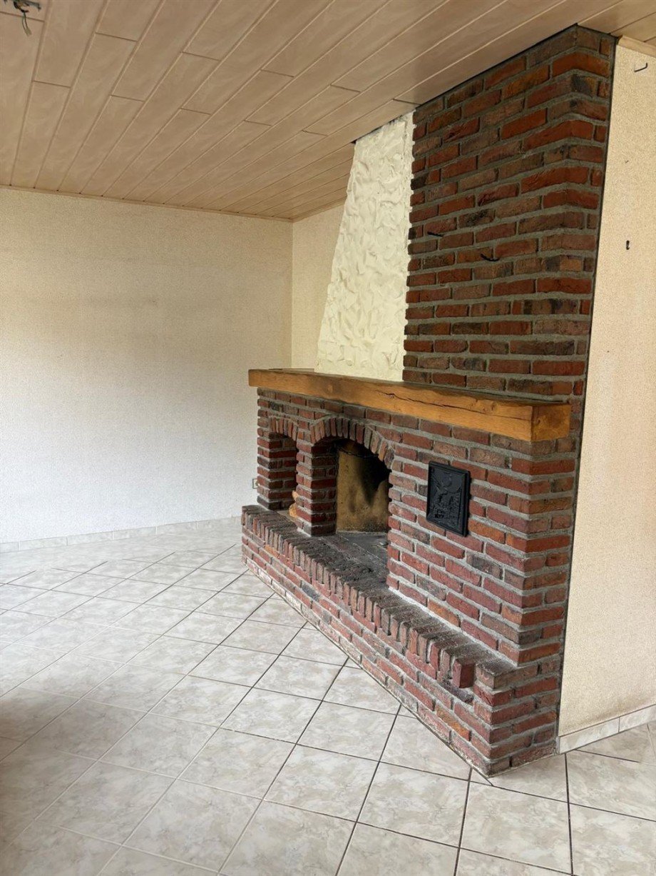 EG-Wohnzimmer-offener-Kamin Zweifamilienhaus Rudersberg