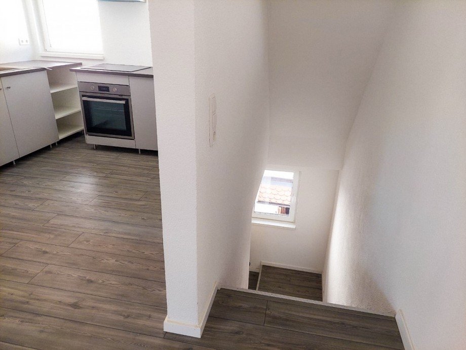 Treppenaufgang zum Wohn-, Essbereich Dachgeschosswohnung Welzheim